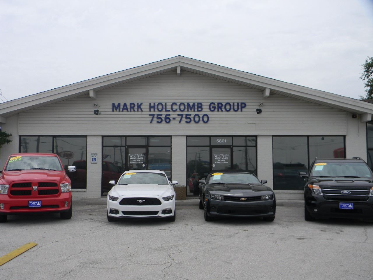 MARK HOLCOMB  GROUP PRE-OWNED