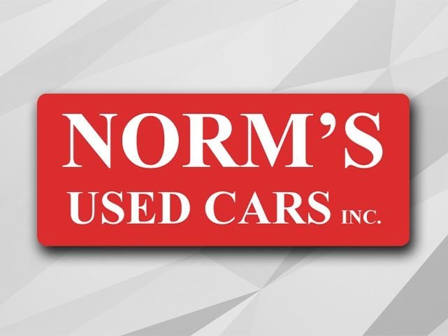 NORM'S USED CARS INC